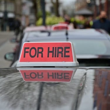 Photo by Watford London Media: https://www.pexels.com/photo/rooftop-of-taxi-11368144/