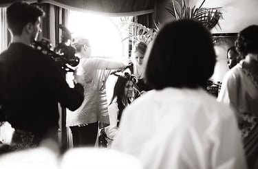 Makeup artist working on a bride