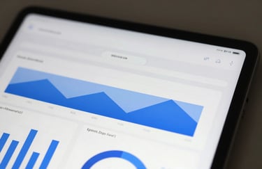 A close-up of a digital tablet showing a clean, analytical research report with graphs. Minimalist composition. Colors: #D4DCE4, #1A3E6F, #F8F8F8.