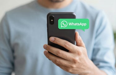 A person using a smartphone with a WhatsApp chat bubble visible, conveying seamless human interaction and intuitive tech, in #F8FBFD environment.