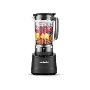 A black NutriBullet blender filled with almonds, fresh fruit, and ice for making a healthy smoothie.