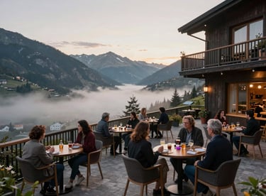 A wide shot of a refined mountain lodge patio where guests enjoy drinks overlooking a mist sage valley.