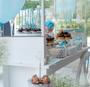 candy cart with different donuts displayed