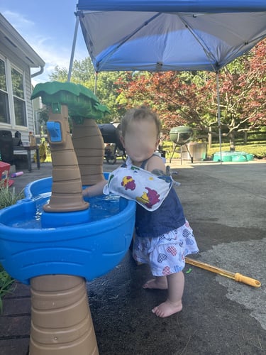 Toddler outdoor play with broken wrist