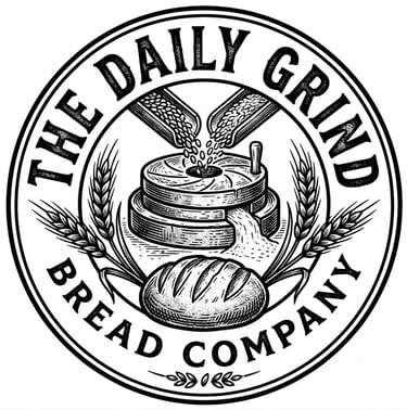 The Daily Grind Bread Company logo