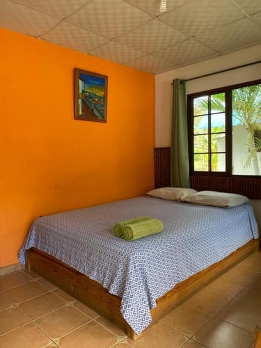 Double room with queen bed and mountain view at Rainforest Yasmin Inn Santa Fe Panama