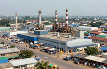 An image of a modern industrial facility or a busy Nigerian marketplace, symbolizing a vibrant and growing economy. The composition is dynamic, showcasing activity and growth with a professional color grade.