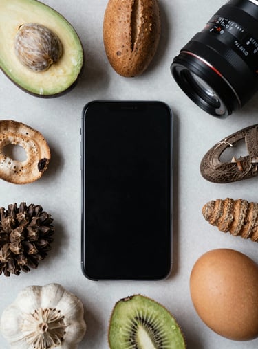 A top-down flat lay of organic ingredients and a smartphone, representing modern food content creation.