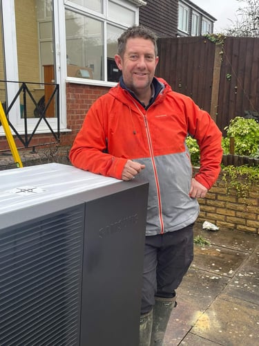 Heat pump being installed by an engineer