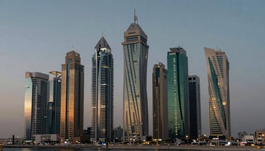 A wide shot of a massive infrastructure project in the desert under a golden sunset, representing GCC engineering growth.