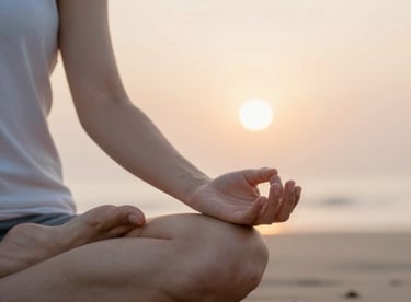 The hands of a person in Gyan Mudra, resting on knees, during a sunrise meditation session, soft focus background.