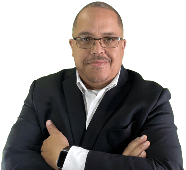 Bishop Chris black suit no tie casual arms crossed