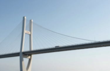 A conceptual image of a bridge connecting two points under a clear sky, symbolizing the link between current effort and future security, with #DFE6EB tones.