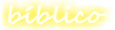 A glowing yellow neon sign displaying the Spanish word 'bíblico' in cursive script font against a black background.