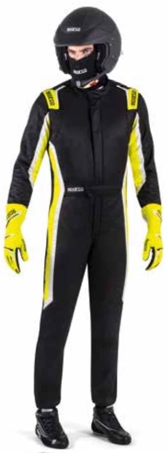 Professional driver wearing a black and yellow Sparco racing suit, helmet, and gloves.
