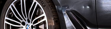 BMW fender damage. Aluminium panel