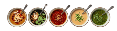 Row of five various dipping sauces in white bowls, including sesame, soy, chili oil, and fresh herbs.