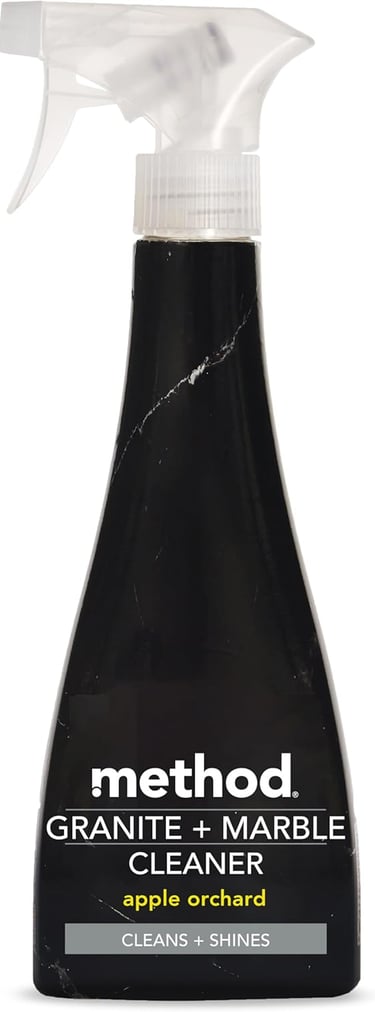 Method apple orchard scented granite and marble cleaner spray in a black 28 ounce bottle.