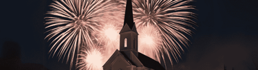 a church with fireworks