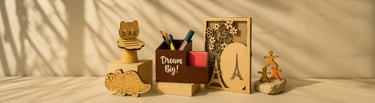 Handcrafted wooden desk organizers and laser-cut stationery accessories displayed in warm natural light.