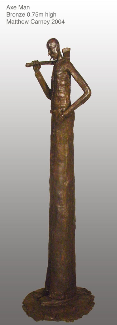 a bronze statue of an axeman with an axe on his should