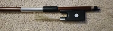 Violin bow with a german silver wrapping and a black goatskin grip