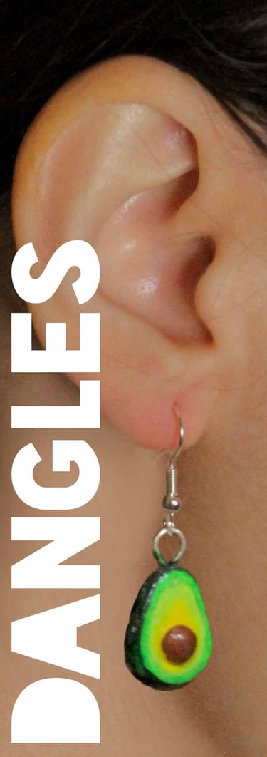 a woman wearing a green avocado earrings