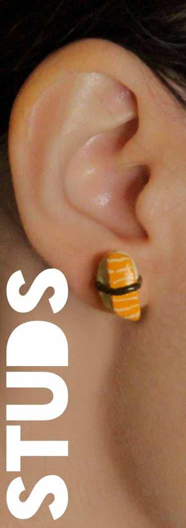 a woman with a sushi earring