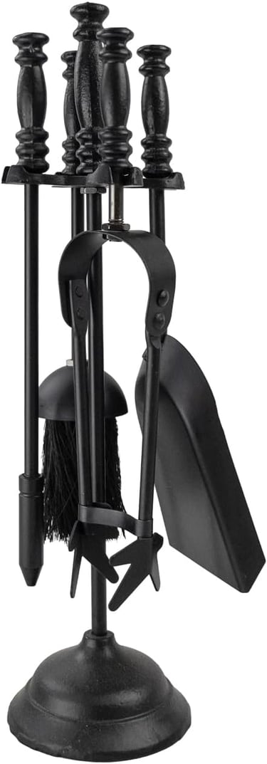 a black and white candle holder with a broom and a broom