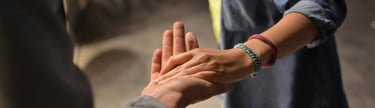 two people holding hands