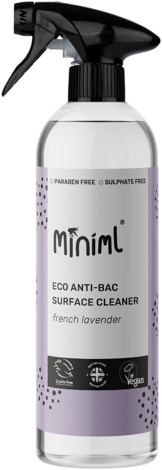 a spray bottle of minimil eco - friendly cleaner