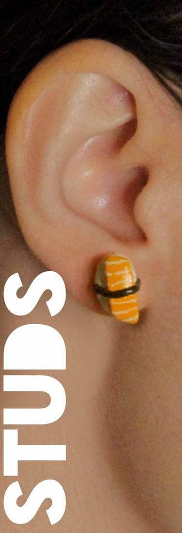 a woman with a sushi earring