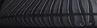 black paint that has been corrected professionally near me using professionally paint correction methods