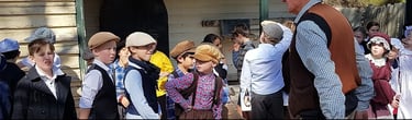 A school group visiting Old Tailem Town and getting into character