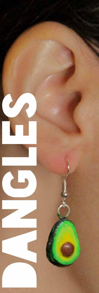 a woman wearing a green avocado earrings