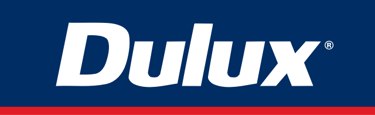 Dulux paint brand logo with white italicized text on a dark blue background with a red stripe.