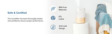 Levoit humidifier on white table beside sofa with BPA-free and ETL certification badges