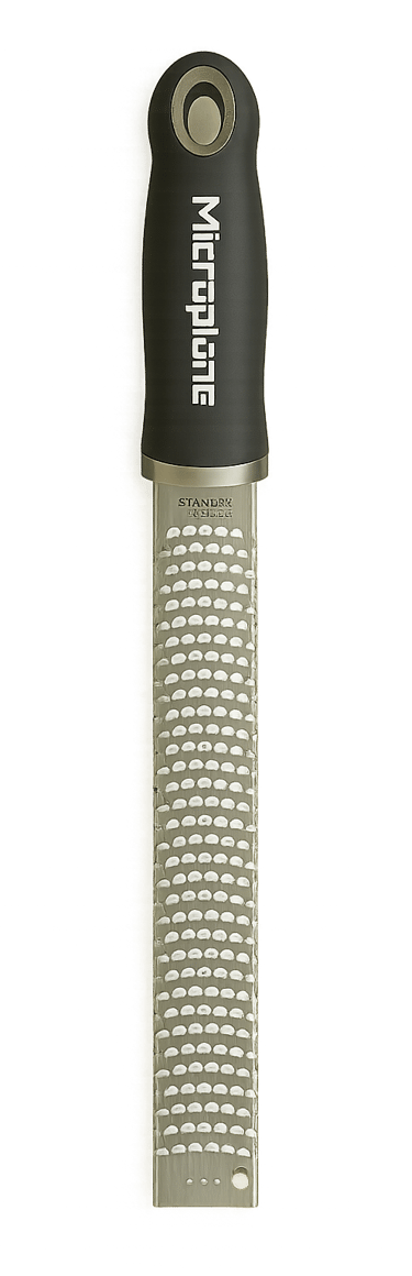 Microplane stainless steel zester grater with black handle on a white background