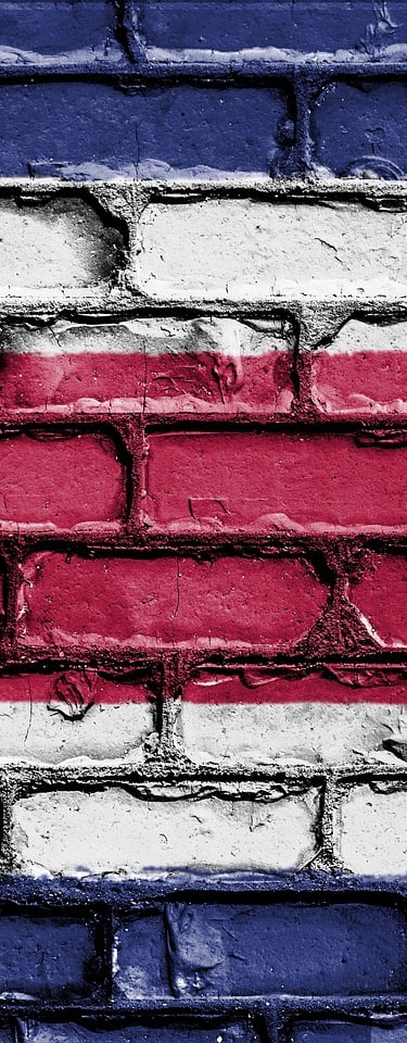 Costa Rica flag colors on brick wall
