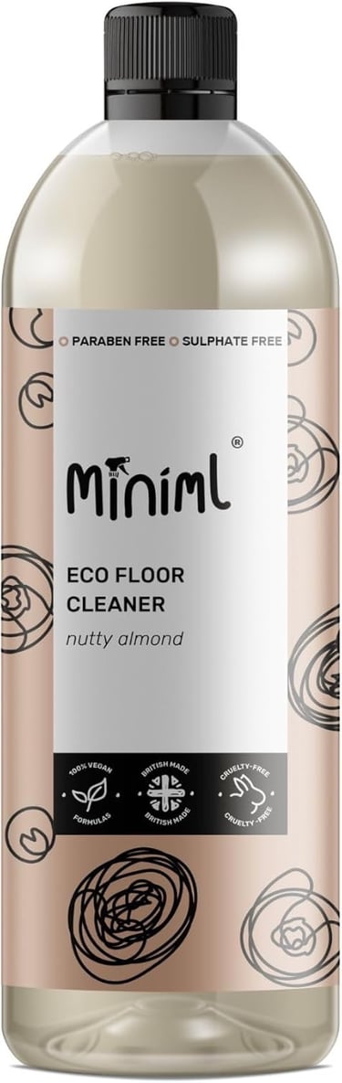 a bottle of eco - friendly cleaner with a bottle of cleaner