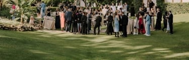 Garden event at Villa El Rincon with guests gathered among lush greenery