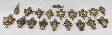 "Handcrafted brass key rings with different tribal designs–front view-Shipped worldwide"