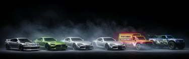 a group of four cars are shown in a row