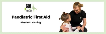 First aider comforting a young chid with an arm around their shoulder