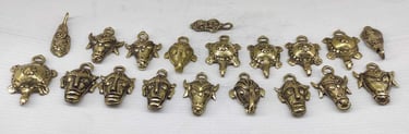"Handcrafted brass key rings with different tribal designs–front view-Shipped worldwide"