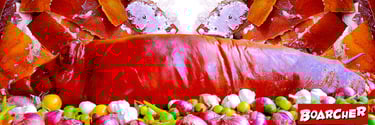 big lechon on a table as a centerpiece with vegetables underneath it