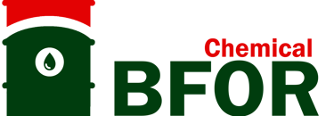 a green and red sign with a clock tower in the background