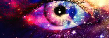 a person's eye looking at a galaxy - like eye