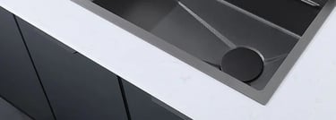 a kitchen sink and a cutting board