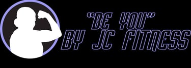 a man in a black shirt and a black and white sign that says be your